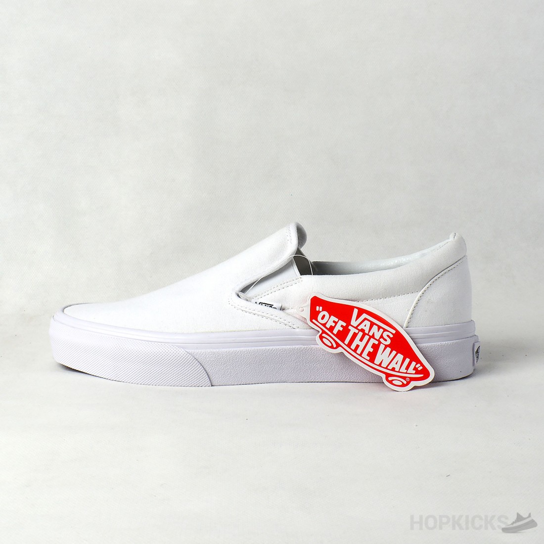 Witte slip on online vans